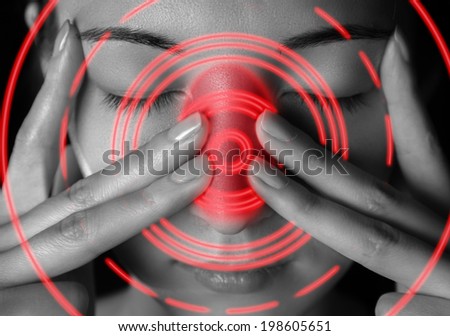 Woman is touching her nose and temporal region, woman is sick or tired, pain area of red color