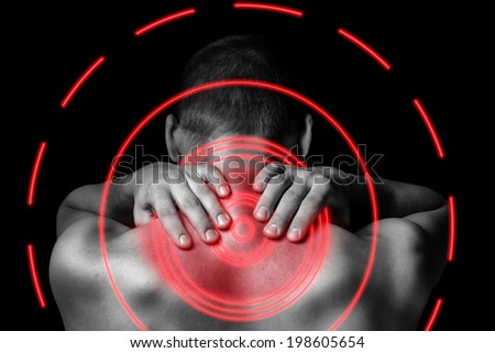 Unrecognizable man touches neck, pain in the neck, rear view, pain area of red color
