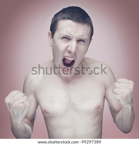Male clenched his fists and yelling