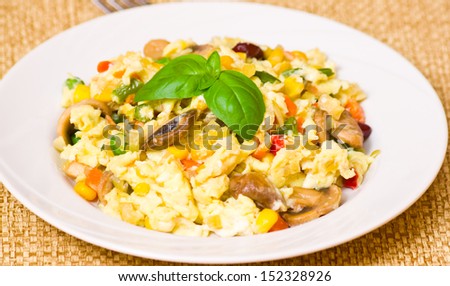 scrambled eggs with mushrooms and vegetables