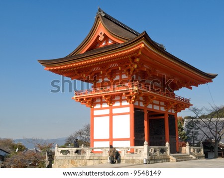 Gateway of Kiyomizu Temple in Kyoto Japan, with the city of Kyoto in the background. Kiyomizu-dera is one of the most famous and most visited temples in Kyoto.