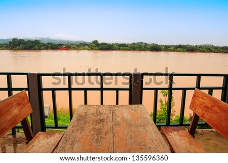 Table in a restaurant on the river