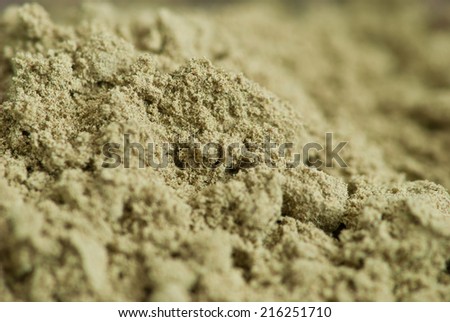 close up of heap of raw organic hemp protein powder