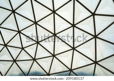 the metal and glass roof inside of botanical dome