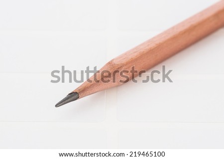 closeup pencil on sticky label background