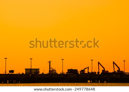 silhouette of Industrial shipping port in thailand