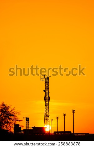 silhouette of radar tower at shipping port in thailand