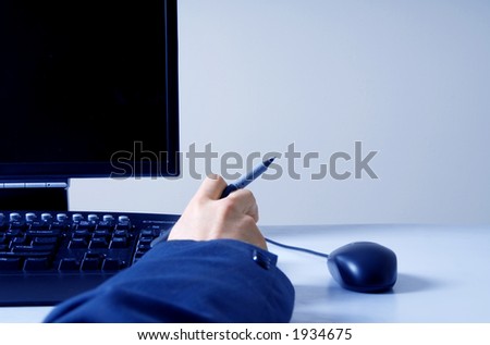 businessman in front of a computer