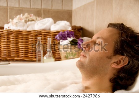 man client in a spa taking an aroma bath