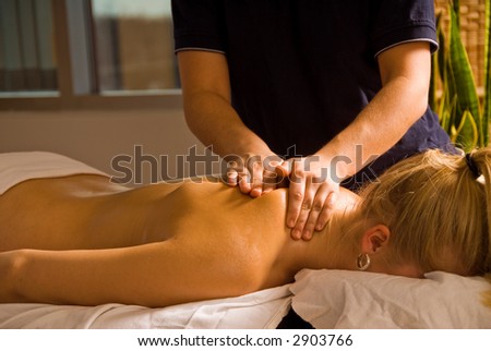 woman at a day spa getting a massage