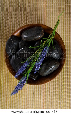 bowl of hot stones for lastone massage