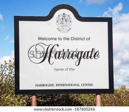 A road sign welcoming people to Harrogate, the end of Day 1 of the 2014 Tour De France in Yorkshire, England, UK