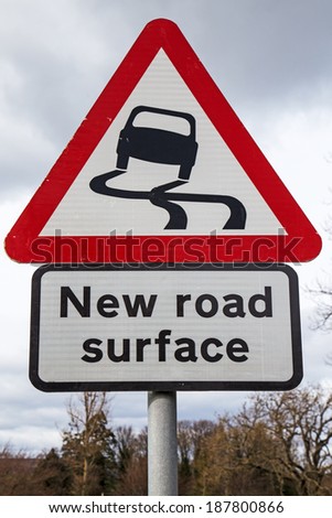 A road sign warning of a newly laid surface on the  route of the 2014 Tour de France in Yorkshire, England UK.  Many of the roads on the route have been resurfaced.