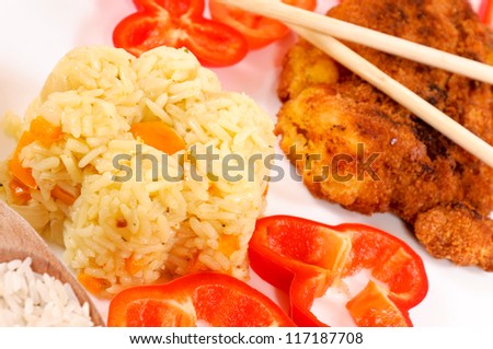 Prepared rice with vegetables. Selective focus on the rice