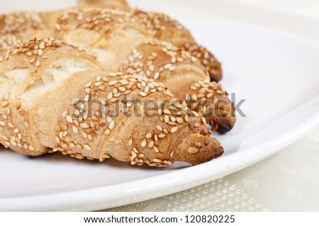 Close up to croissants with sesame