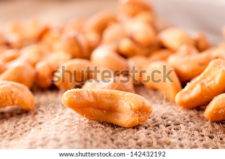 Close up to roasted single cashew nut