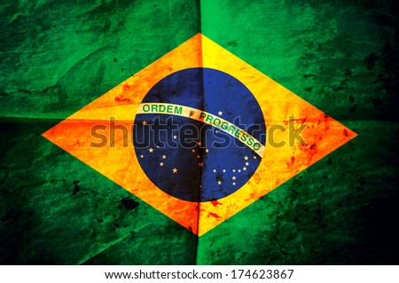 Old Creased Paper With Brazlilian Flag As The Background