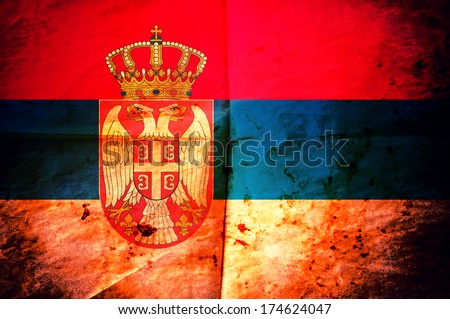 Old creased paper with Serbian flag as the background