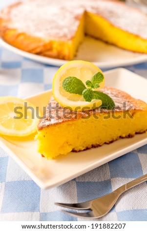 Homemade lemon cake on the plate.Selective focus on the front part of cake
