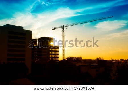 Construction site with sun reflection on the building