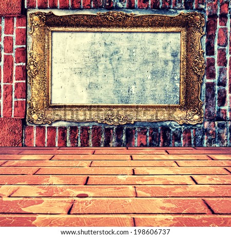 Empty old frame on the bricks wall