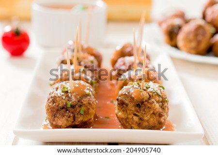 Beef meat balls in the plate.Selective focus on the front meat balls