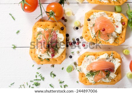Salmon sandwich with cream cheese and crackers,selective focus
