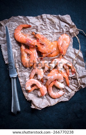 Large group of boiled tiger shrimps on the table from above