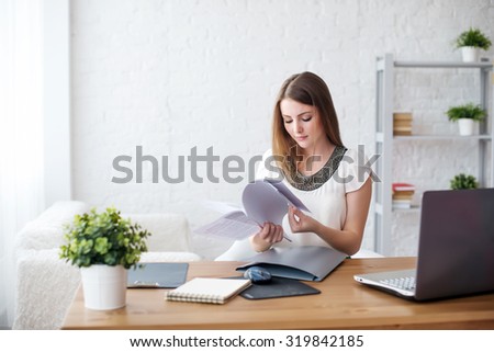 businesswoman with laptop and diary concept freelance work at home, planning, scheduling.