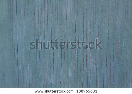 horizontal orientation close up of a vintage, aged, wooden panel painted in porcelain blue paint, with copy space / Vintage Porcelain Blue painted wood
