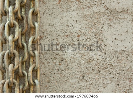 horizontal orientation close up of several chains on a concrete background with copy space / Overcoming Chains - Horizontal