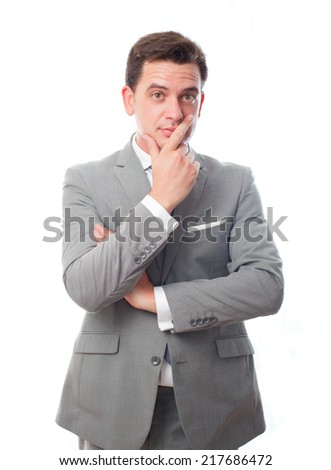 Young business man over white background. Paying attention