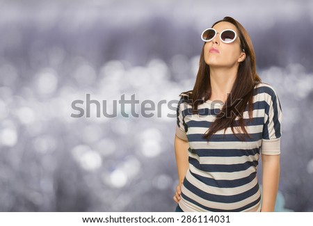 Woman with white sunglasses. Over abstract background