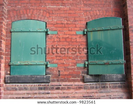 Metal windows on old brick factory.  Toronto.  Canada.
