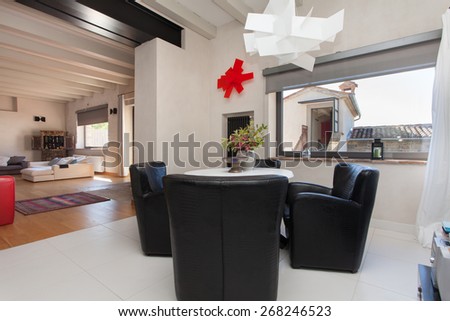living room and dining area of a modern villa in countryside