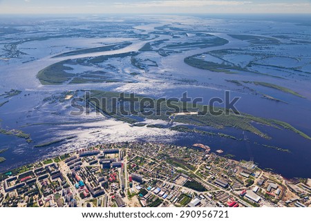 Ob River Flood June 2015 Aerial View of same houses in vicinity of Nizhnevartovsk, Tyumen region, Russia. Aerial view over the lowland of Great river.