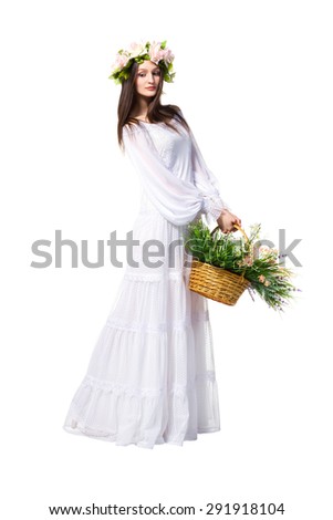 Beautiful girl in a romantic clothing with a wreath on his head, isolated on white background