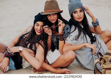 three beautiful girls on the beach