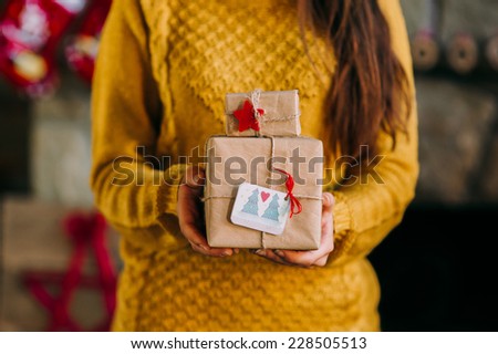 gift in the hands of a girl