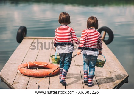 Twin sisters on Wooden pier