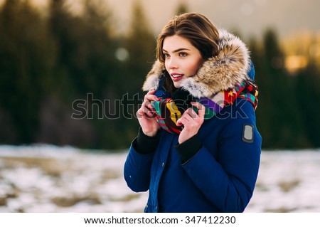 Beautiful Young Smiling Girl in her Winter Warm Clothing