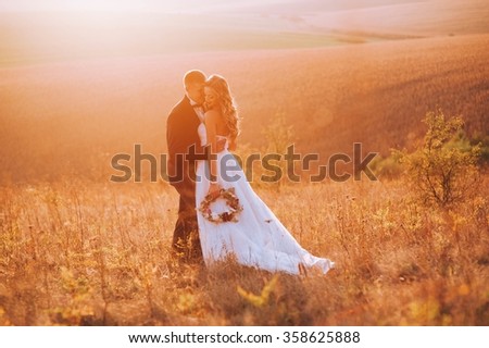 Fine art photo of an attractive wedding couple