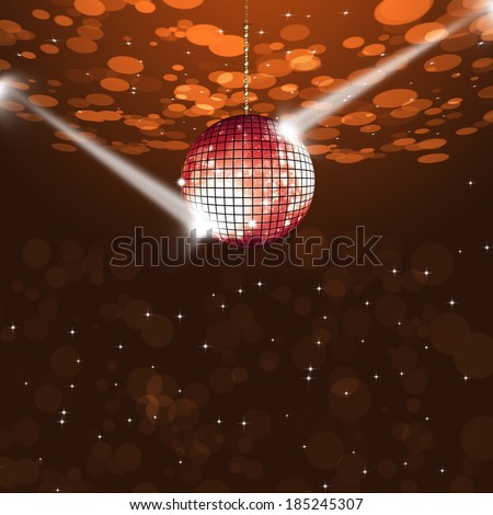 music disco ball on dark red background with blurry lights