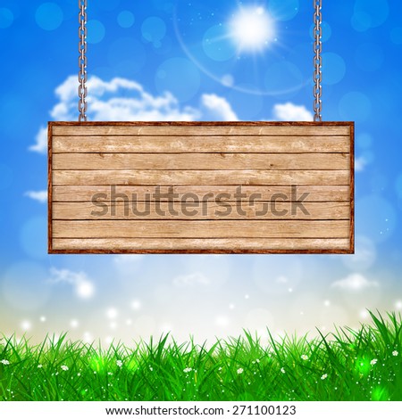 bright blurry green spring nature background with wood notice on chains
