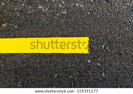New black asphalt road with yellow line