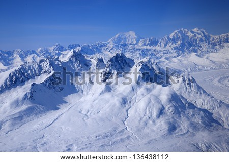 alaska mountain at denali national park with snow as seen from a plane