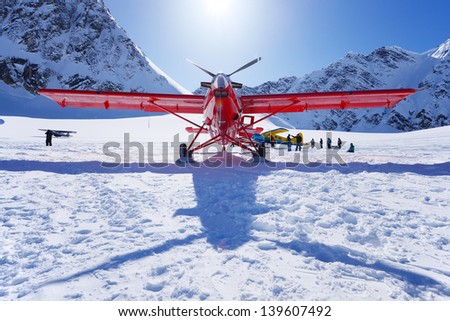 a plane landing on glacier in alaska