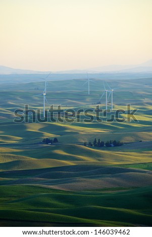 hill in southeast washington with wind mill farm