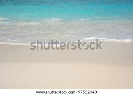 turquoise color sea water with white and clean sand beach from southern andaman