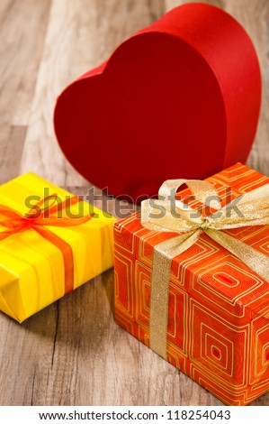 It is red yellow gift boxes, a close up